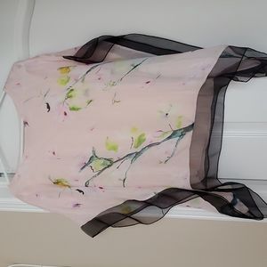 Beautiful poncho style blouse.